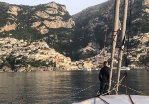 View of Positano from the bow of CM46 catamaran Rush