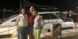 Mark and Liz Rushall with Amanda on the quay in Agia Effimia