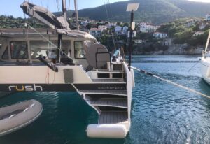 CM46 performance catamaran Rush moored stern to in Kioni