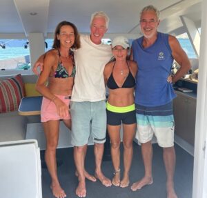 Friends on board CM46 high performance cruising catamaran Rush